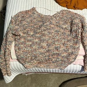 Twisted back multi fall colored sweater